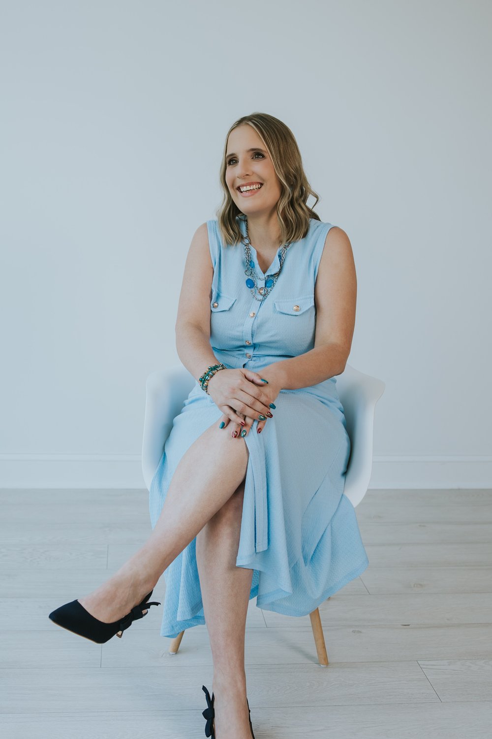 Maren Londahl-Smidt, relaxed and laughing in a chair
