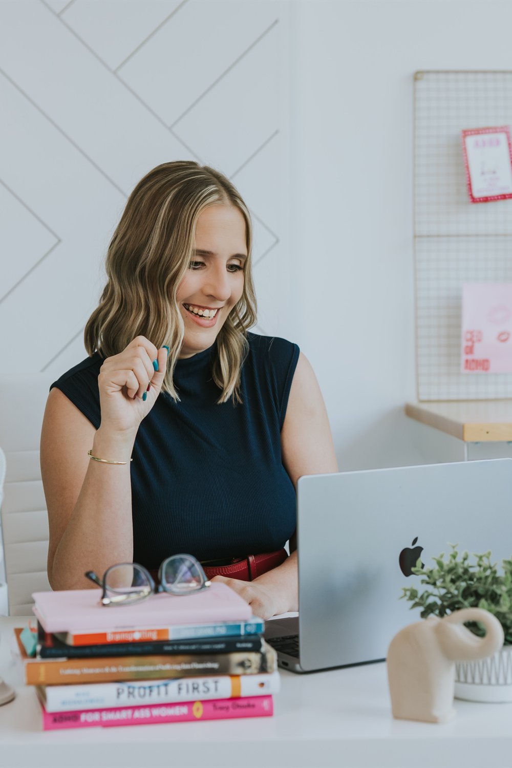 Maren Londahl-Smidt at her desk, laughing
